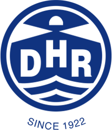 Das blaue Markenlogo von Den Haan Rotterdam mit dem Schriftzug DHR und der Aufschrift Since 1922 im runden Design.